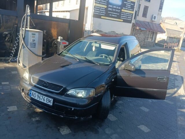 Черный Опель Астра, объемом двигателя 5 л и пробегом 330 тыс. км за 1420 $, фото 9 на Automoto.ua