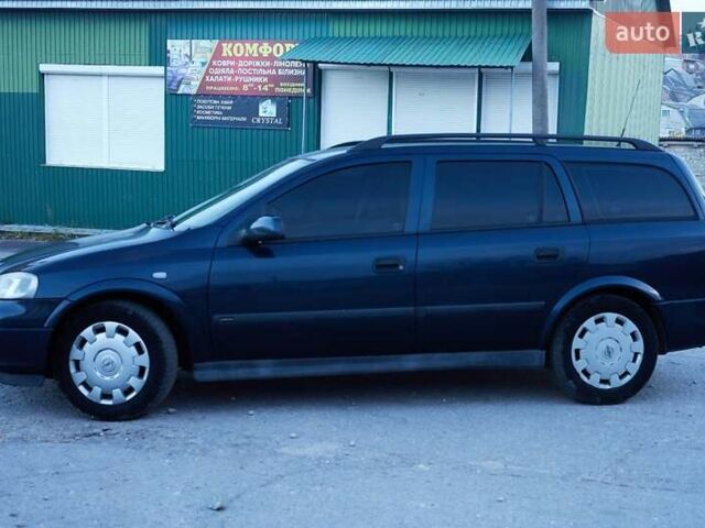 Черный Опель Астра, объемом двигателя 1.7 л и пробегом 270 тыс. км за 3900 $, фото 3 на Automoto.ua