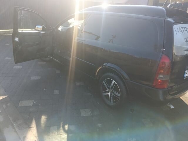 Черный Опель Астра, объемом двигателя 5 л и пробегом 330 тыс. км за 1420 $, фото 4 на Automoto.ua