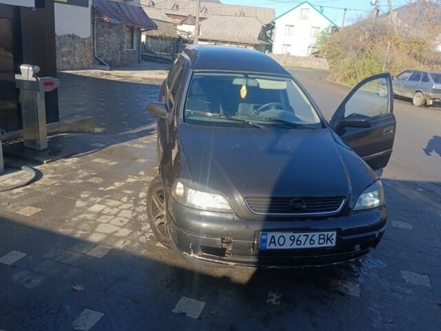 Черный Опель Астра, объемом двигателя 5 л и пробегом 330 тыс. км за 1420 $, фото 6 на Automoto.ua