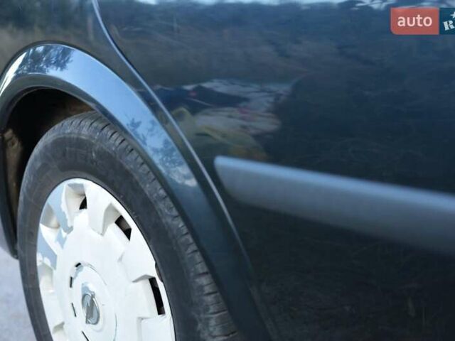 Черный Опель Астра, объемом двигателя 1.7 л и пробегом 270 тыс. км за 3900 $, фото 8 на Automoto.ua