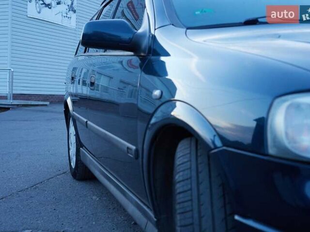 Черный Опель Астра, объемом двигателя 1.7 л и пробегом 270 тыс. км за 3900 $, фото 1 на Automoto.ua