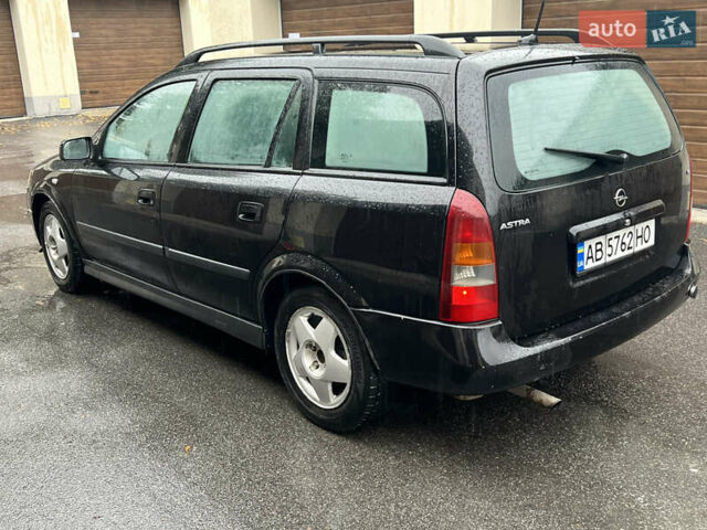 Черный Опель Астра, объемом двигателя 1.6 л и пробегом 250 тыс. км за 2650 $, фото 3 на Automoto.ua