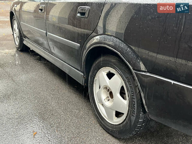 Черный Опель Астра, объемом двигателя 1.6 л и пробегом 250 тыс. км за 2650 $, фото 7 на Automoto.ua
