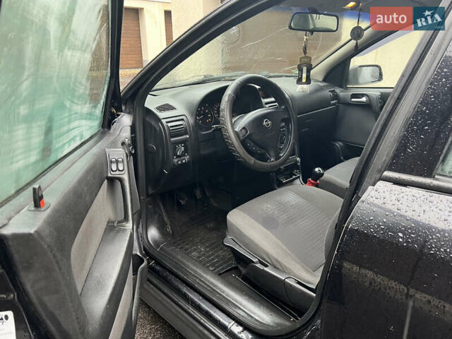 Черный Опель Астра, объемом двигателя 1.6 л и пробегом 250 тыс. км за 2650 $, фото 12 на Automoto.ua