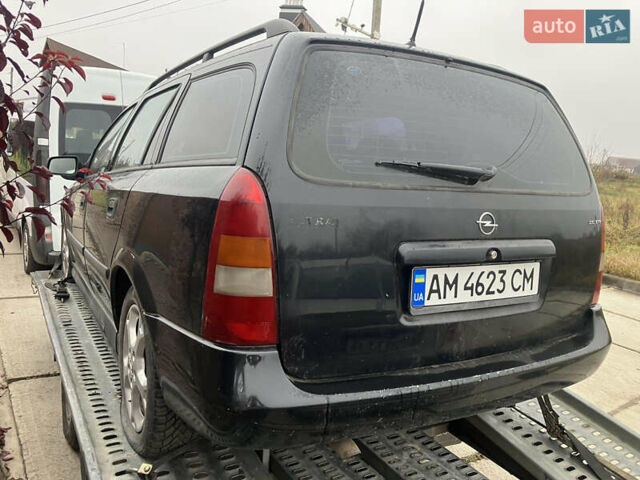 Черный Опель Астра, объемом двигателя 2.2 л и пробегом 300 тыс. км за 1800 $, фото 3 на Automoto.ua