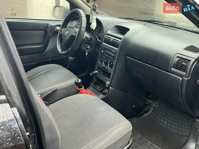 Черный Опель Астра, объемом двигателя 1.6 л и пробегом 250 тыс. км за 2650 $, фото 10 на Automoto.ua