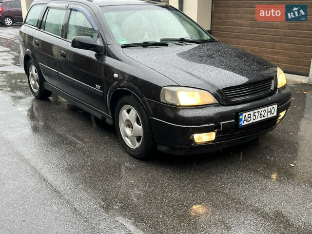 Черный Опель Астра, объемом двигателя 1.6 л и пробегом 250 тыс. км за 2650 $, фото 1 на Automoto.ua