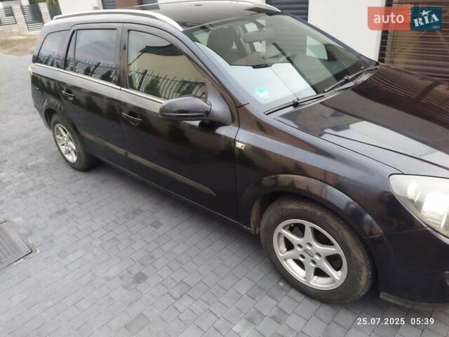 Черный Опель Астра, объемом двигателя 1.8 л и пробегом 218 тыс. км за 3500 $, фото 5 на Automoto.ua
