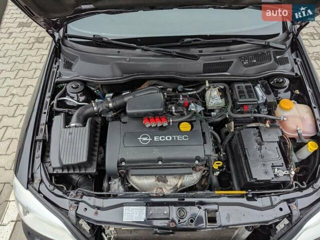 Черный Опель Астра, объемом двигателя 1.6 л и пробегом 280 тыс. км за 3850 $, фото 18 на Automoto.ua