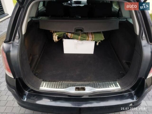 Черный Опель Астра, объемом двигателя 1.8 л и пробегом 218 тыс. км за 3500 $, фото 7 на Automoto.ua