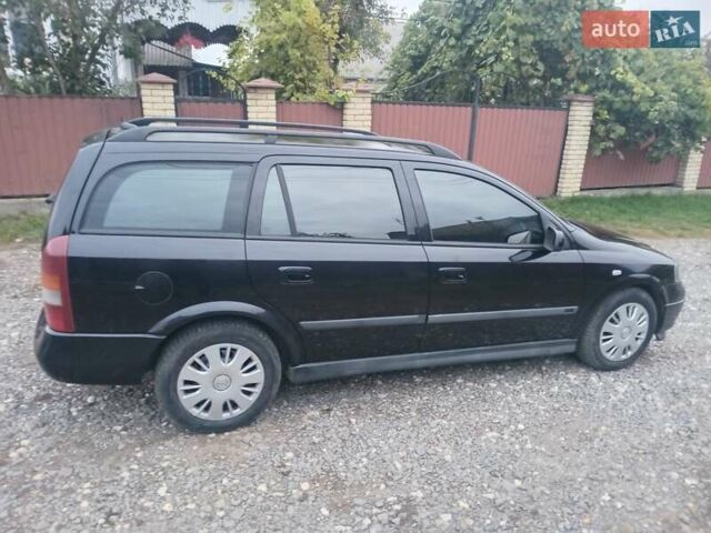 Черный Опель Астра, объемом двигателя 1.6 л и пробегом 232 тыс. км за 3000 $, фото 7 на Automoto.ua