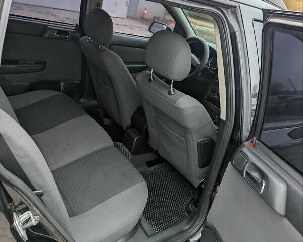 Черный Опель Астра, объемом двигателя 1.6 л и пробегом 280 тыс. км за 3850 $, фото 4 на Automoto.ua