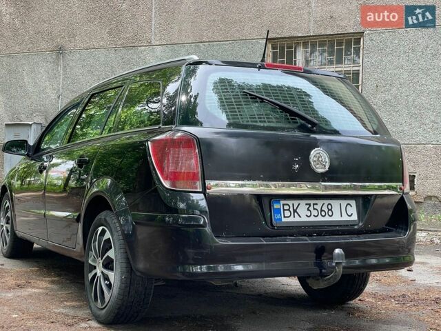Черный Опель Астра, объемом двигателя 1.91 л и пробегом 225 тыс. км за 4200 $, фото 11 на Automoto.ua