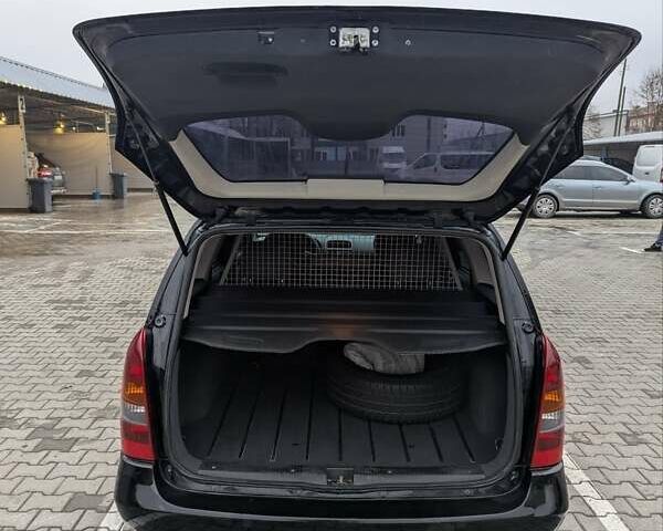 Черный Опель Астра, объемом двигателя 1.6 л и пробегом 280 тыс. км за 3850 $, фото 19 на Automoto.ua