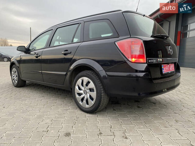 Черный Опель Астра, объемом двигателя 1.6 л и пробегом 231 тыс. км за 4800 $, фото 4 на Automoto.ua