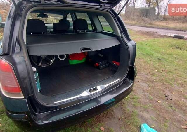 Черный Опель Астра, объемом двигателя 1.9 л и пробегом 320 тыс. км за 4999 $, фото 10 на Automoto.ua