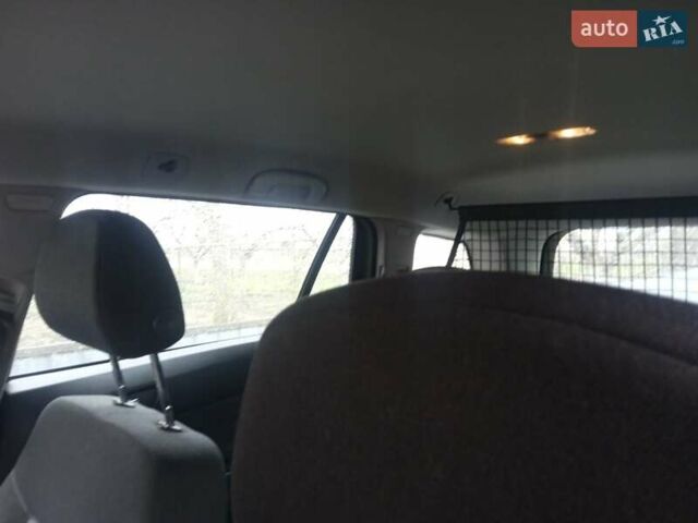 Черный Опель Астра, объемом двигателя 1.8 л и пробегом 198 тыс. км за 4800 $, фото 7 на Automoto.ua