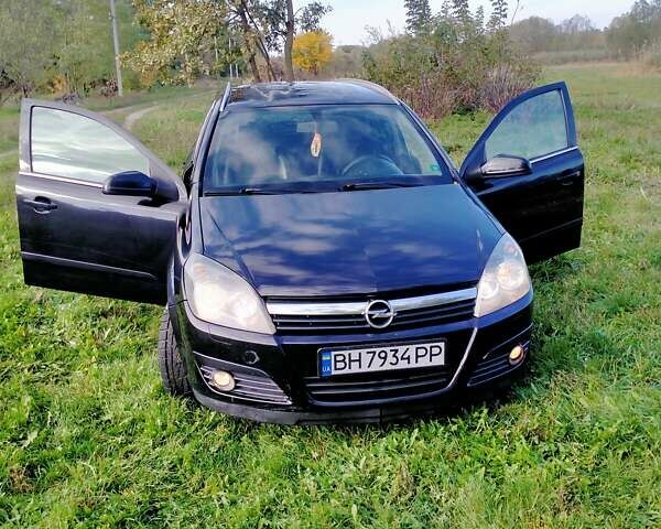 Черный Опель Астра, объемом двигателя 1.7 л и пробегом 212 тыс. км за 4700 $, фото 1 на Automoto.ua