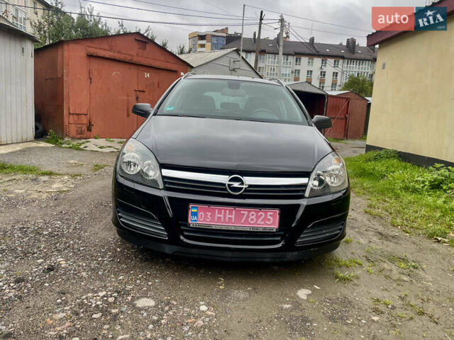 Черный Опель Астра, объемом двигателя 1.6 л и пробегом 211 тыс. км за 4700 $, фото 24 на Automoto.ua