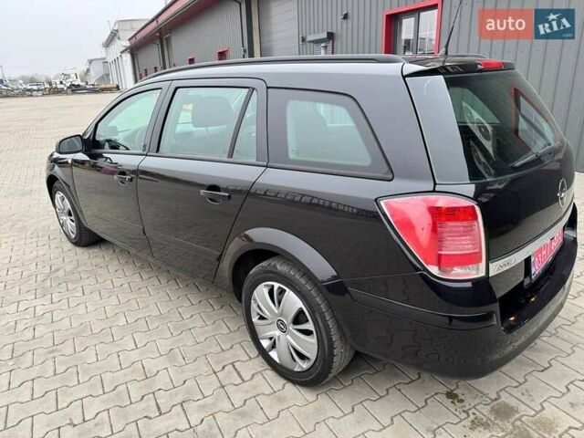 Черный Опель Астра, объемом двигателя 1.6 л и пробегом 229 тыс. км за 4900 $, фото 5 на Automoto.ua