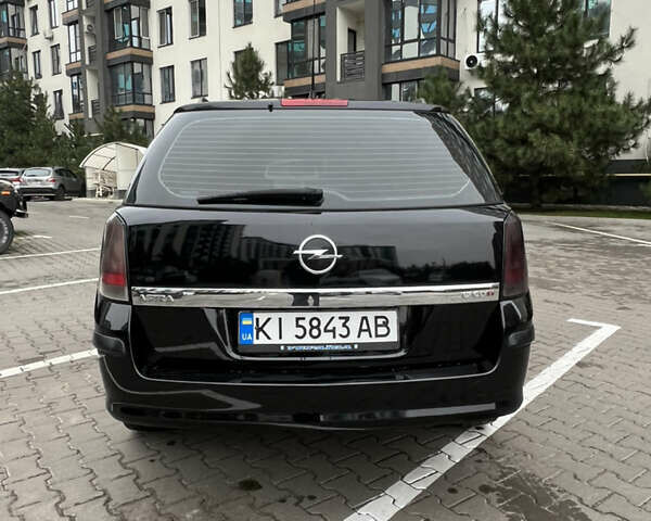 Черный Опель Астра, объемом двигателя 1.7 л и пробегом 330 тыс. км за 5200 $, фото 10 на Automoto.ua
