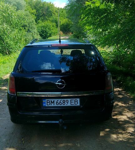 Черный Опель Астра, объемом двигателя 1.6 л и пробегом 283 тыс. км за 4400 $, фото 3 на Automoto.ua