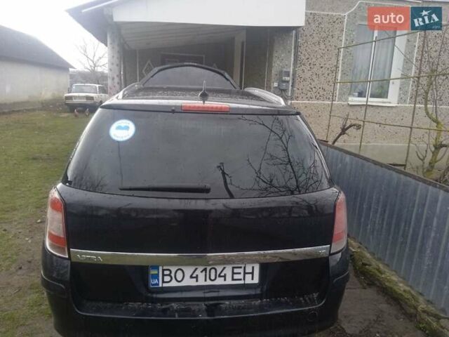 Черный Опель Астра, объемом двигателя 1.8 л и пробегом 198 тыс. км за 4800 $, фото 13 на Automoto.ua