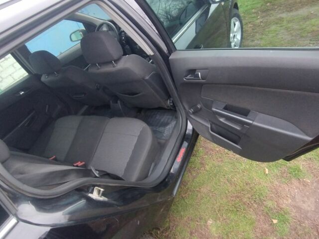 Черный Опель Астра, объемом двигателя 1.9 л и пробегом 320 тыс. км за 4999 $, фото 8 на Automoto.ua