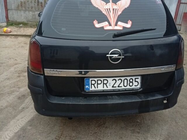 Черный Опель Астра, объемом двигателя 1 л и пробегом 276 тыс. км за 1900 $, фото 3 на Automoto.ua