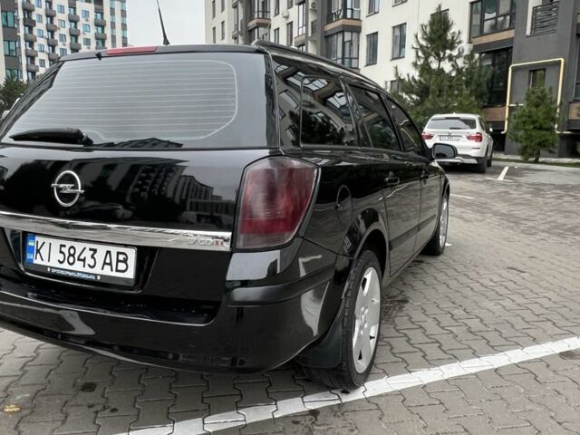 Черный Опель Астра, объемом двигателя 1.7 л и пробегом 330 тыс. км за 5200 $, фото 4 на Automoto.ua