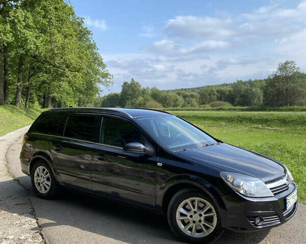 Черный Опель Астра, объемом двигателя 1.91 л и пробегом 295 тыс. км за 5200 $, фото 2 на Automoto.ua