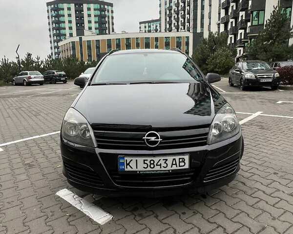 Черный Опель Астра, объемом двигателя 1.7 л и пробегом 330 тыс. км за 5200 $, фото 4 на Automoto.ua