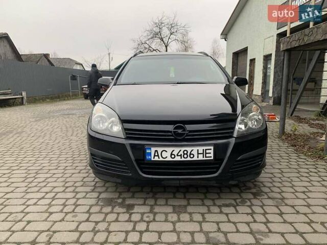 Чорний Опель Астра, об'ємом двигуна 1.25 л та пробігом 317 тис. км за 3500 $, фото 1 на Automoto.ua