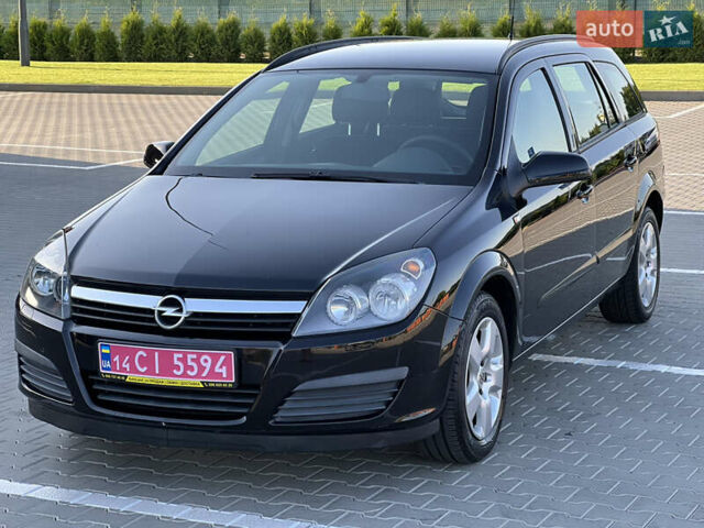 Черный Опель Астра, объемом двигателя 1.6 л и пробегом 235 тыс. км за 5800 $, фото 2 на Automoto.ua