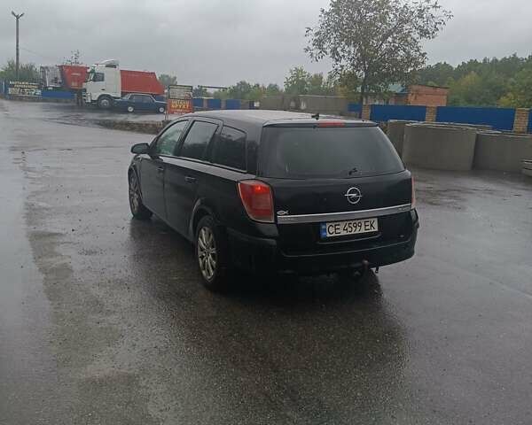 Черный Опель Астра, объемом двигателя 1.6 л и пробегом 415 тыс. км за 4300 $, фото 4 на Automoto.ua