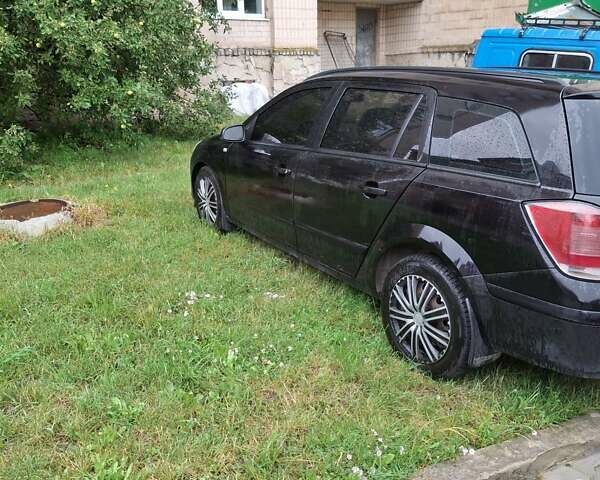 Чорний Опель Астра, об'ємом двигуна 1.69 л та пробігом 350 тис. км за 4000 $, фото 5 на Automoto.ua