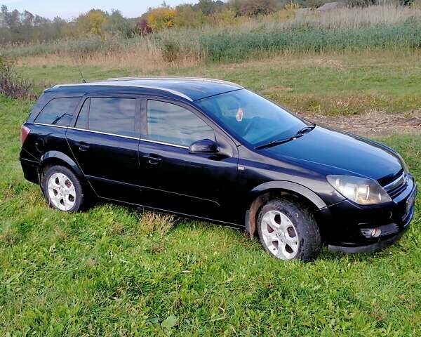 Черный Опель Астра, объемом двигателя 1.7 л и пробегом 212 тыс. км за 4700 $, фото 2 на Automoto.ua