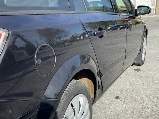 Черный Опель Астра, объемом двигателя 1.7 л и пробегом 320 тыс. км за 4250 $, фото 7 на Automoto.ua