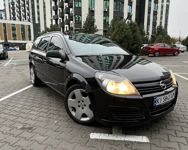 Черный Опель Астра, объемом двигателя 1.7 л и пробегом 330 тыс. км за 5200 $, фото 3 на Automoto.ua
