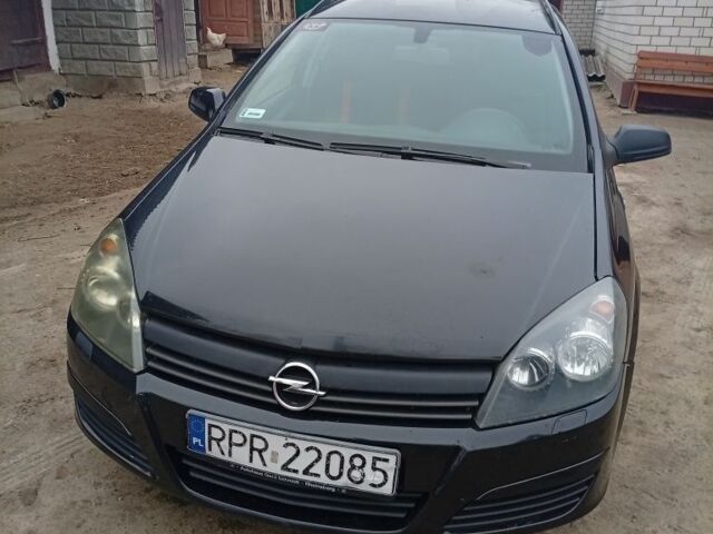 Черный Опель Астра, объемом двигателя 1 л и пробегом 276 тыс. км за 1900 $, фото 1 на Automoto.ua