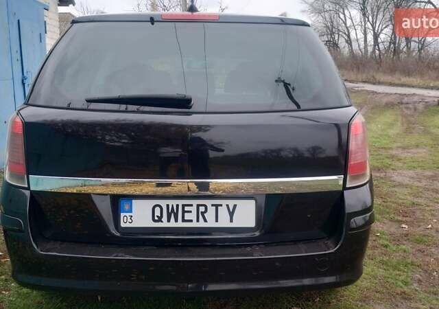 Черный Опель Астра, объемом двигателя 1.9 л и пробегом 320 тыс. км за 4999 $, фото 7 на Automoto.ua