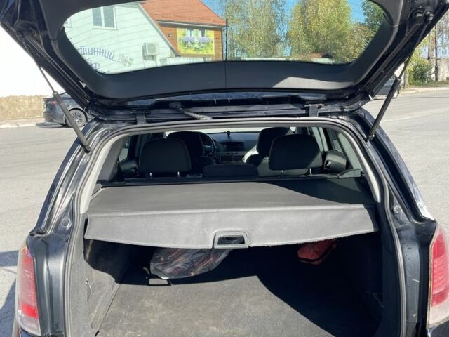 Черный Опель Астра, объемом двигателя 1.7 л и пробегом 320 тыс. км за 4250 $, фото 18 на Automoto.ua