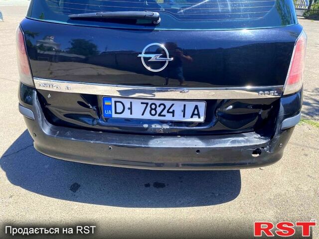 Черный Опель Астра, объемом двигателя 1.8 л и пробегом 225 тыс. км за 4300 $, фото 8 на Automoto.ua