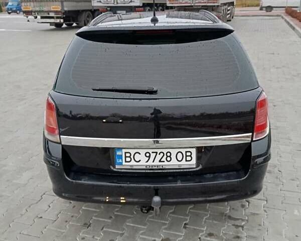 Черный Опель Астра, объемом двигателя 1.6 л и пробегом 293 тыс. км за 4200 $, фото 9 на Automoto.ua