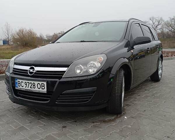 Черный Опель Астра, объемом двигателя 1.6 л и пробегом 293 тыс. км за 4200 $, фото 3 на Automoto.ua