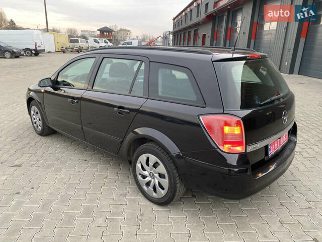 Черный Опель Астра, объемом двигателя 1.6 л и пробегом 231 тыс. км за 4800 $, фото 5 на Automoto.ua