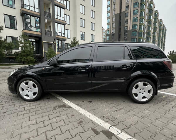 Черный Опель Астра, объемом двигателя 1.7 л и пробегом 330 тыс. км за 5200 $, фото 7 на Automoto.ua