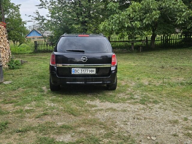 Черный Опель Астра, объемом двигателя 1.9 л и пробегом 380 тыс. км за 4300 $, фото 4 на Automoto.ua