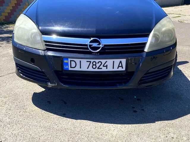 Черный Опель Астра, объемом двигателя 1.8 л и пробегом 225 тыс. км за 4300 $, фото 6 на Automoto.ua